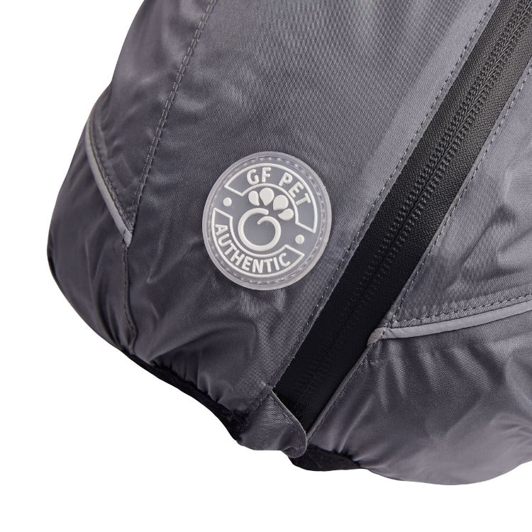 close up shot of the zipper on a grey Splash Suit for dogs