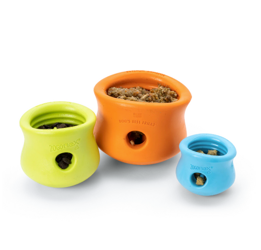 a small green, an extra large orange and a large blue Toppl treat dispensing dog toys