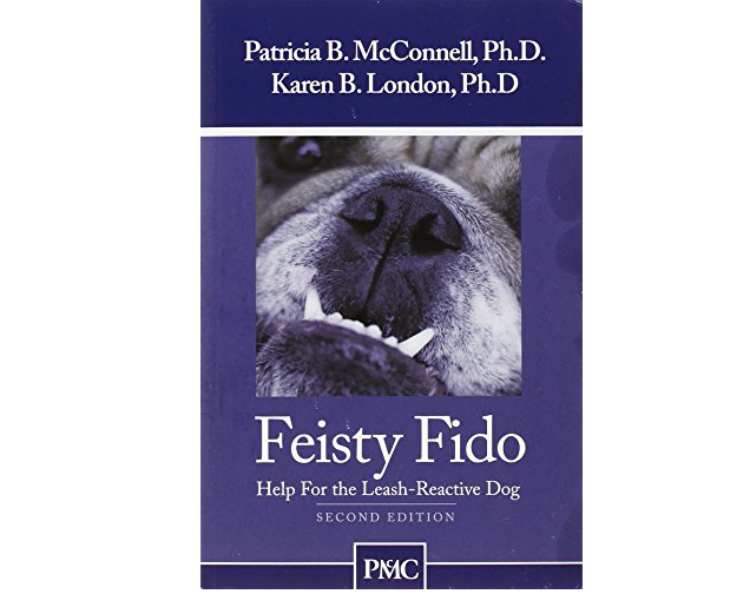 blue book with a closeup photo of the face of a bulldog