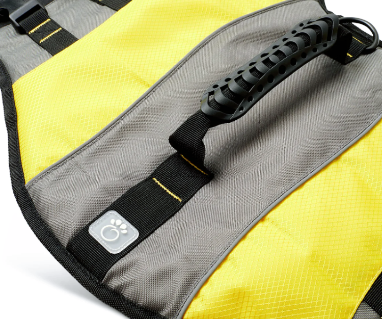 closeup shot off a yellow and grey Dog Life Jacket