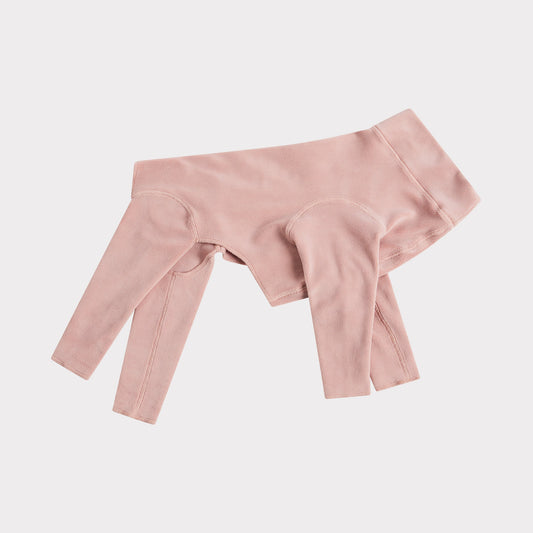 a blush pink fleece dog onesie